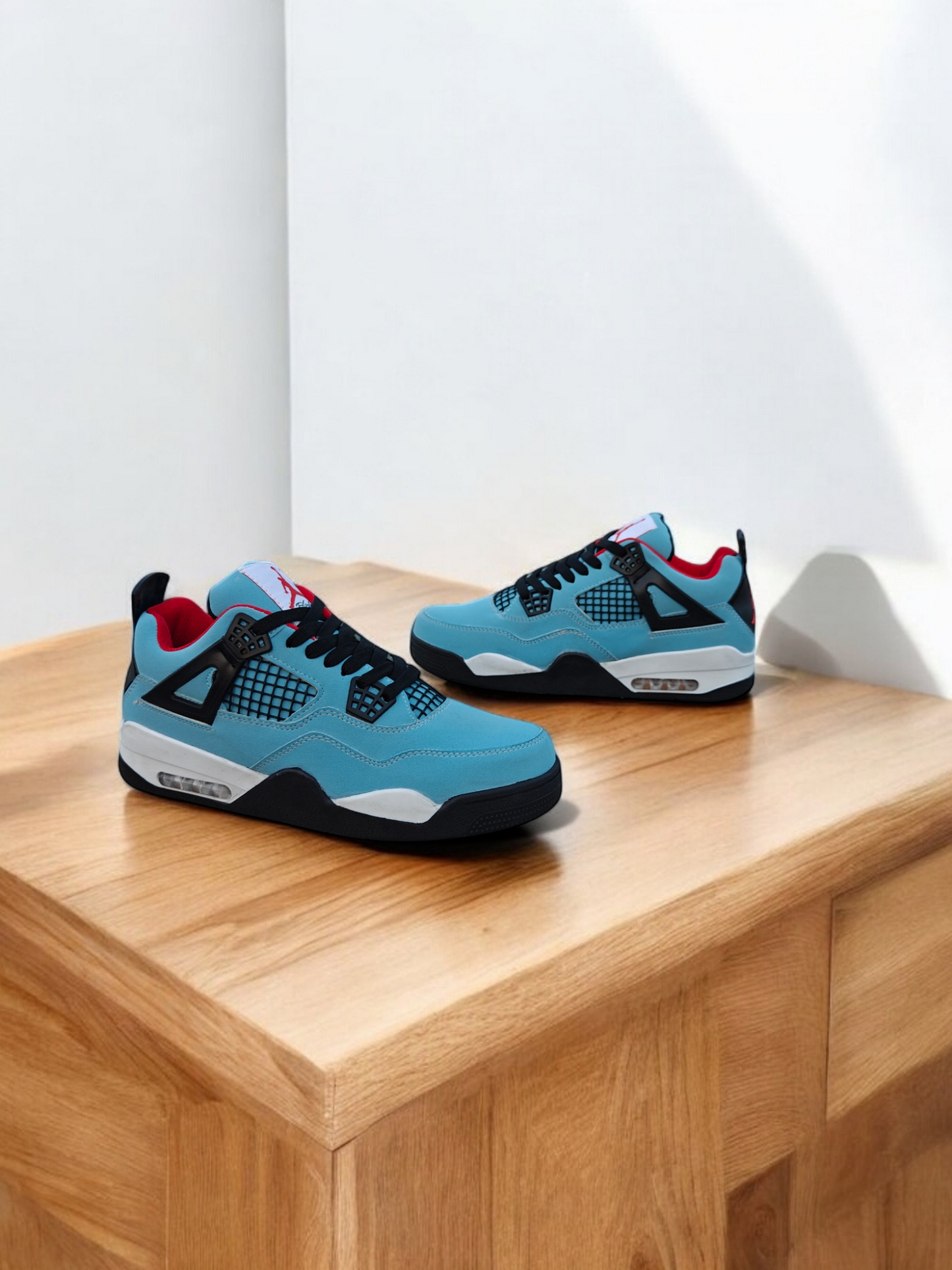 Jordan 4 University Blue