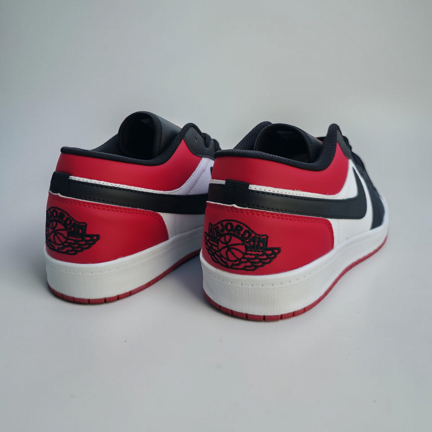 Jordan 1 Low Black Red