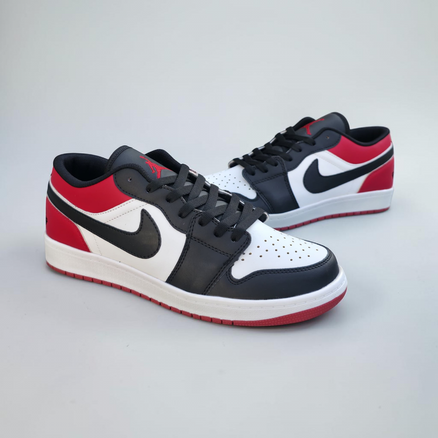 Jordan 1 Low Black Red