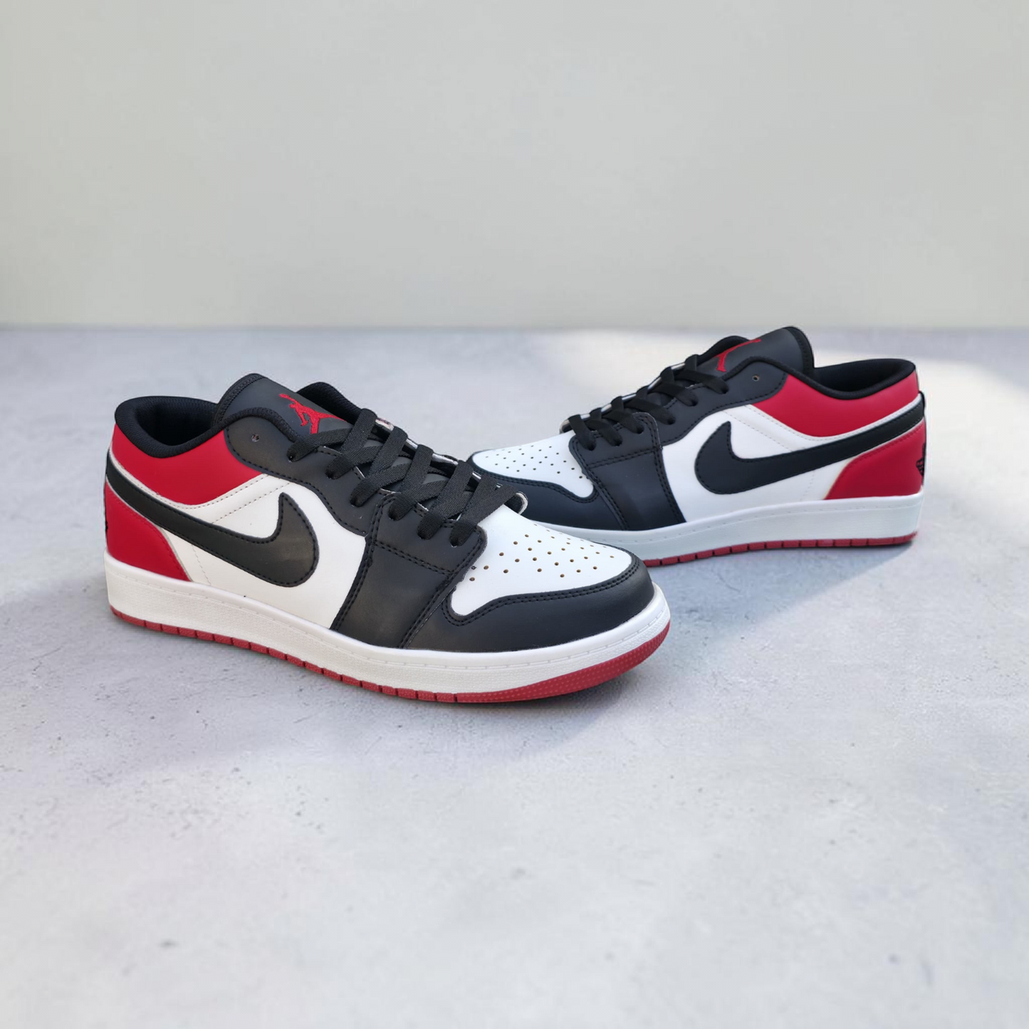 Jordan 1 Low Black Red